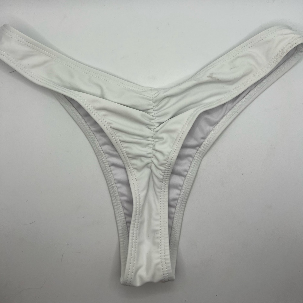 Never worn. White. Small.